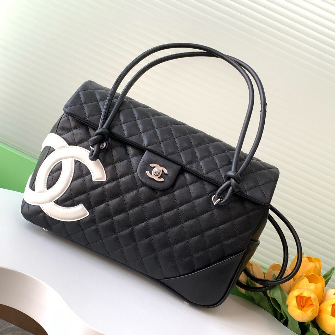 CHANEL CAMBON LARGE FLAP 25S 33 CM IN BLACK CALFSKIN WITH WHITE LOGO