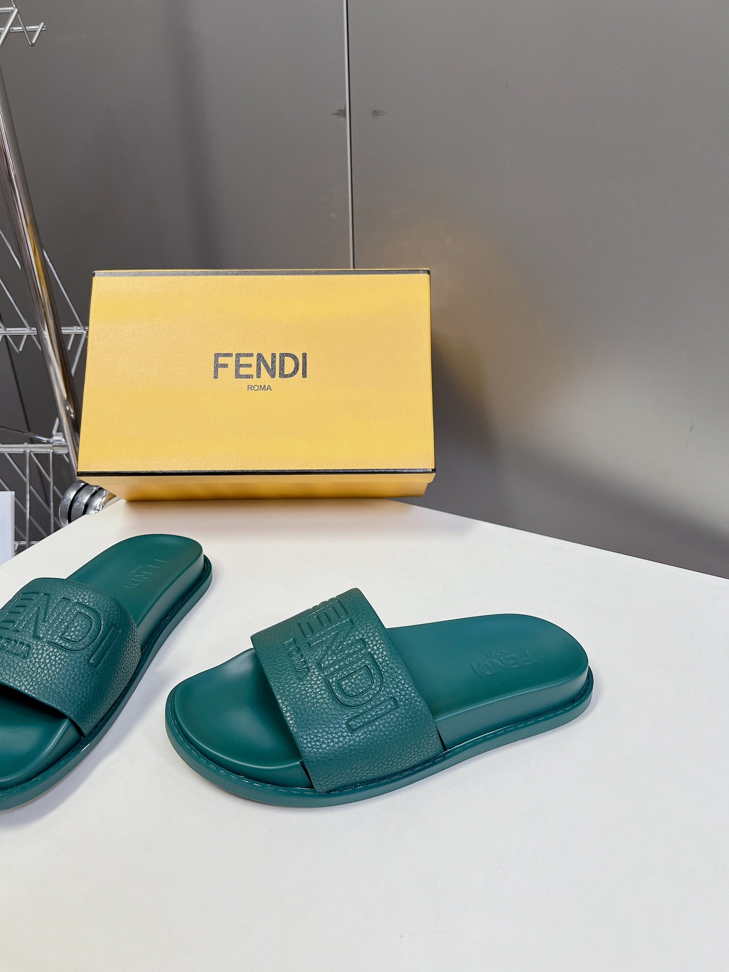 FENDI ROMA SLIDES IN TEAL GREEN LAMBSKIN LEATHER