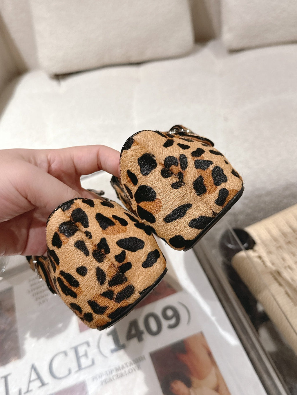 ALAIA 25S CRISS CROSS BALLET FLATS IN LEOPARD SUEDE