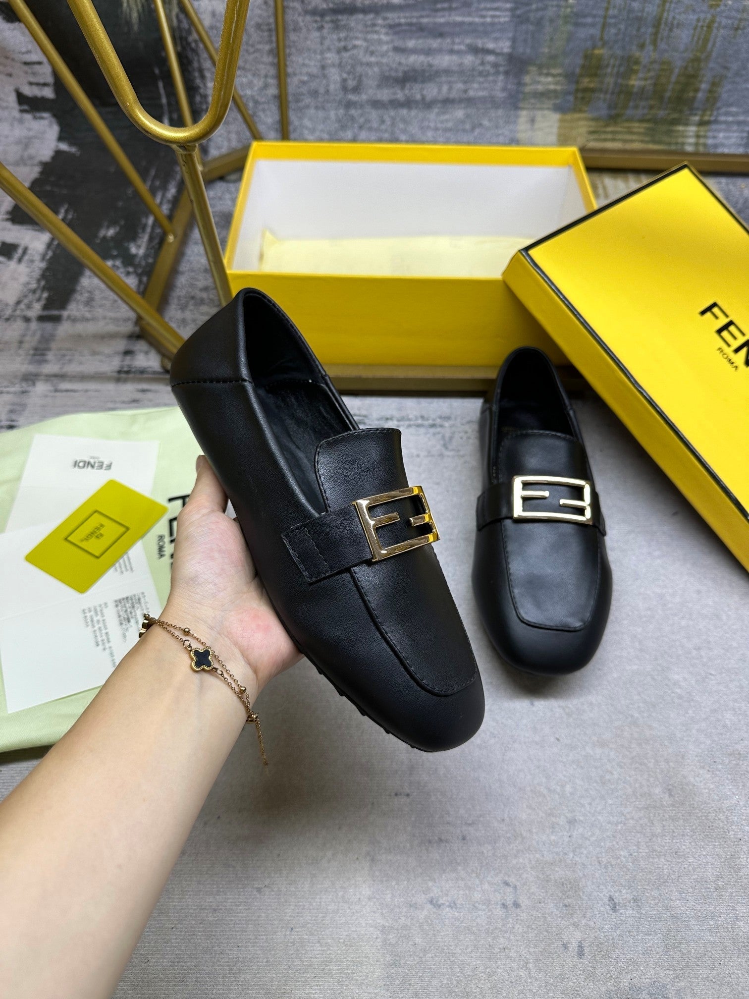FENDI LOAFERS IN BLACK LAMBSKIN GOLD BUCKLE