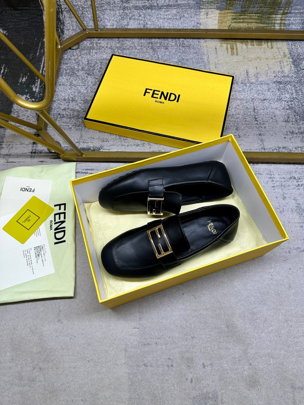 FENDI LOAFERS IN BLACK LAMBSKIN GOLD BUCKLE