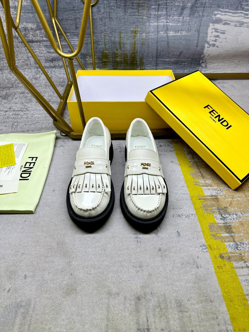 FENDI BAGUETTE LOAFERS IN WHITE CALFSKIN WITH GOLD HARDWARE
