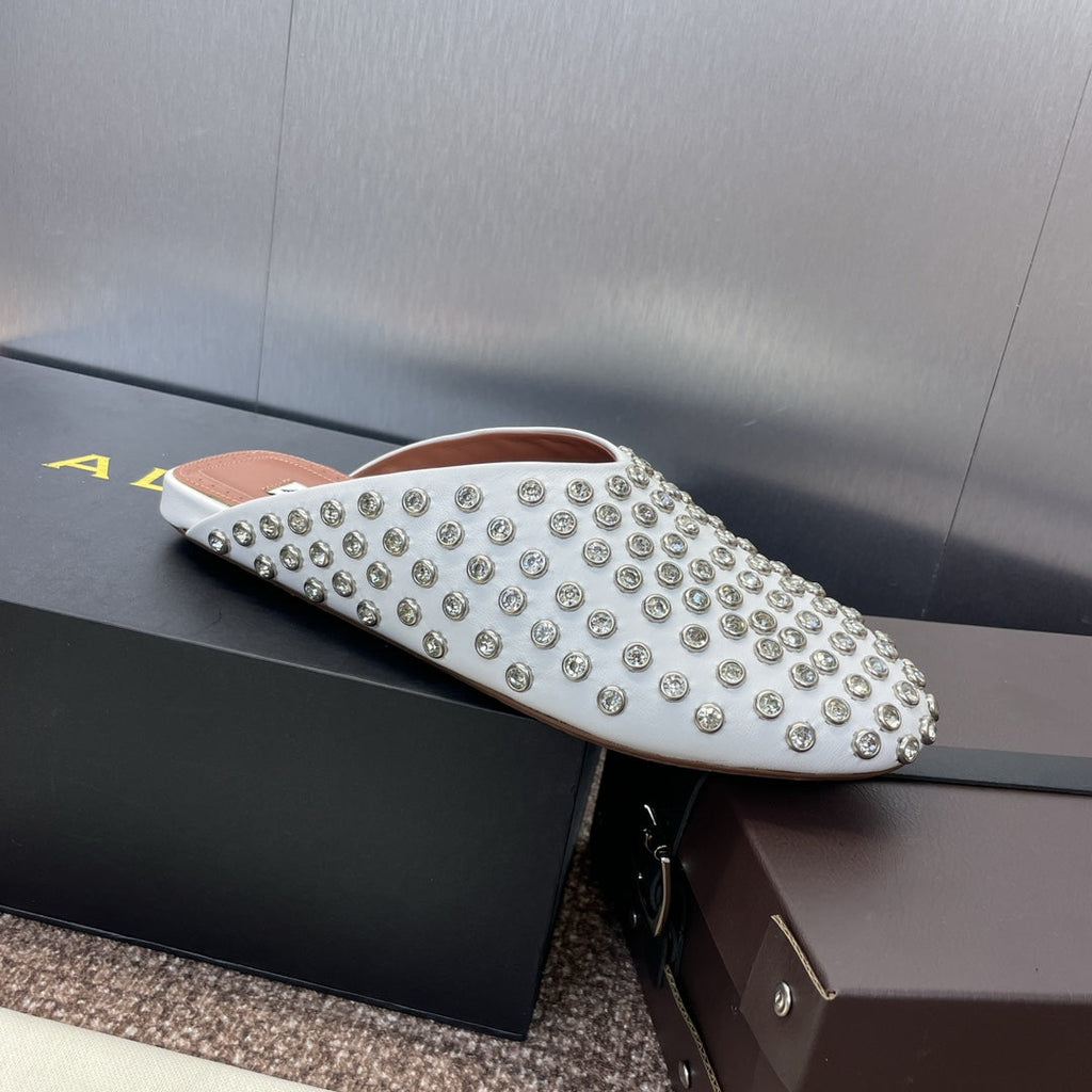ALAIA FLAT MULES 25S IN WHITE LAMBSKIN EMBELLISHED WITH CRYSTALS