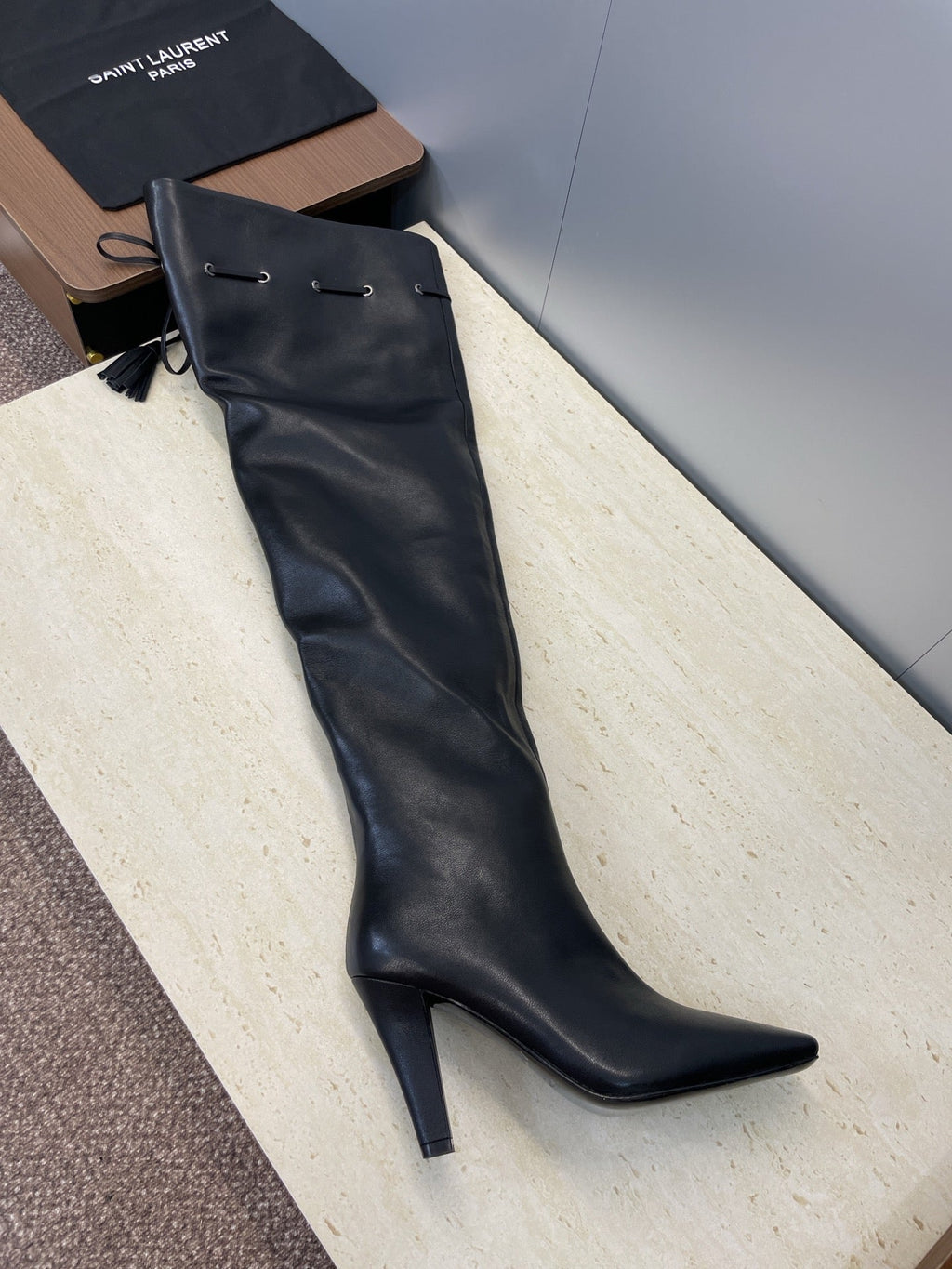 YSL 25S HIGH‑HEEL FRINGED MARTIN BOOTS 90 MM IN BLACK LAMBSKIN