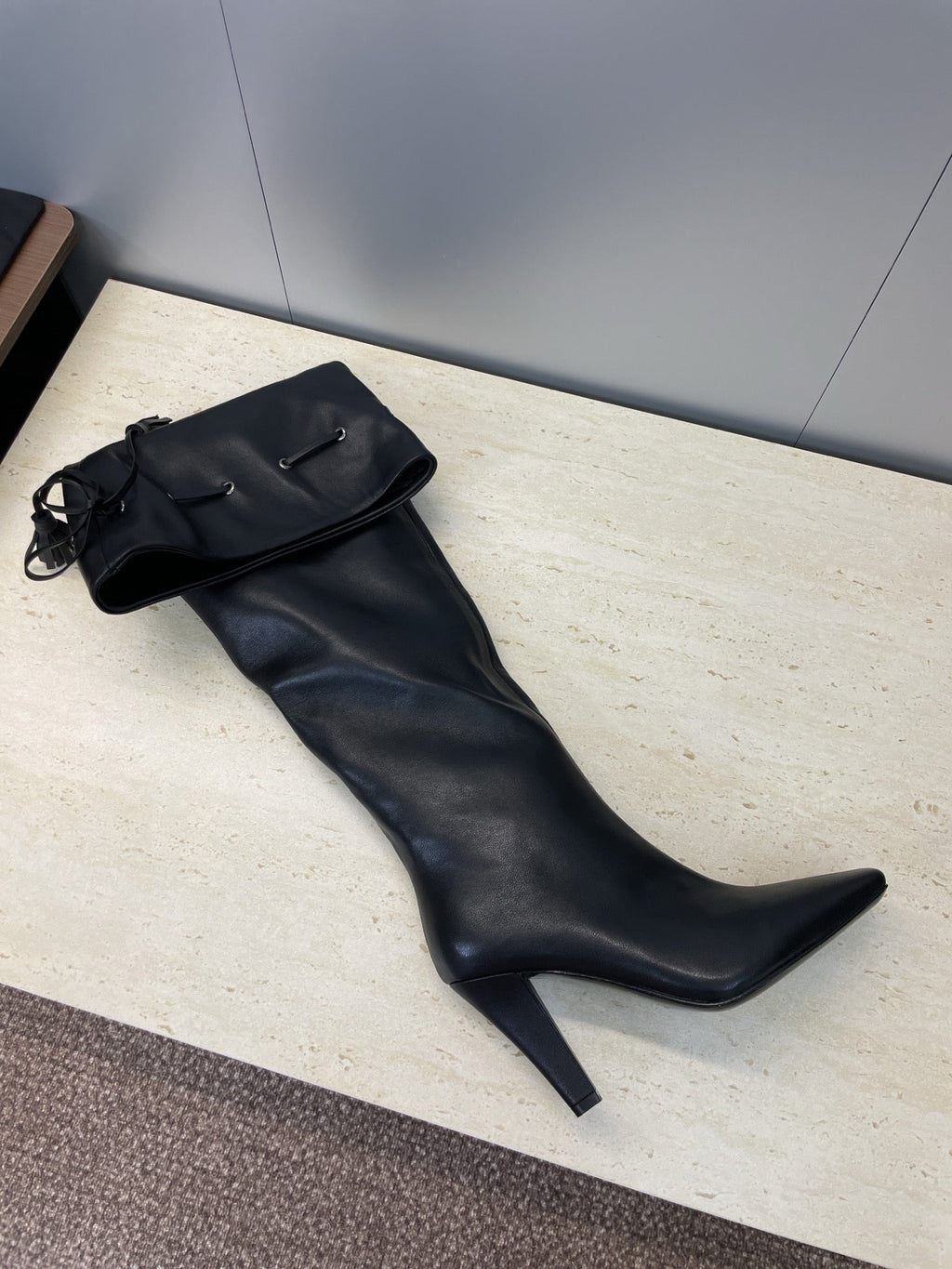 YSL 25S HIGH‑HEEL FRINGED MARTIN BOOTS 90 MM IN BLACK LAMBSKIN