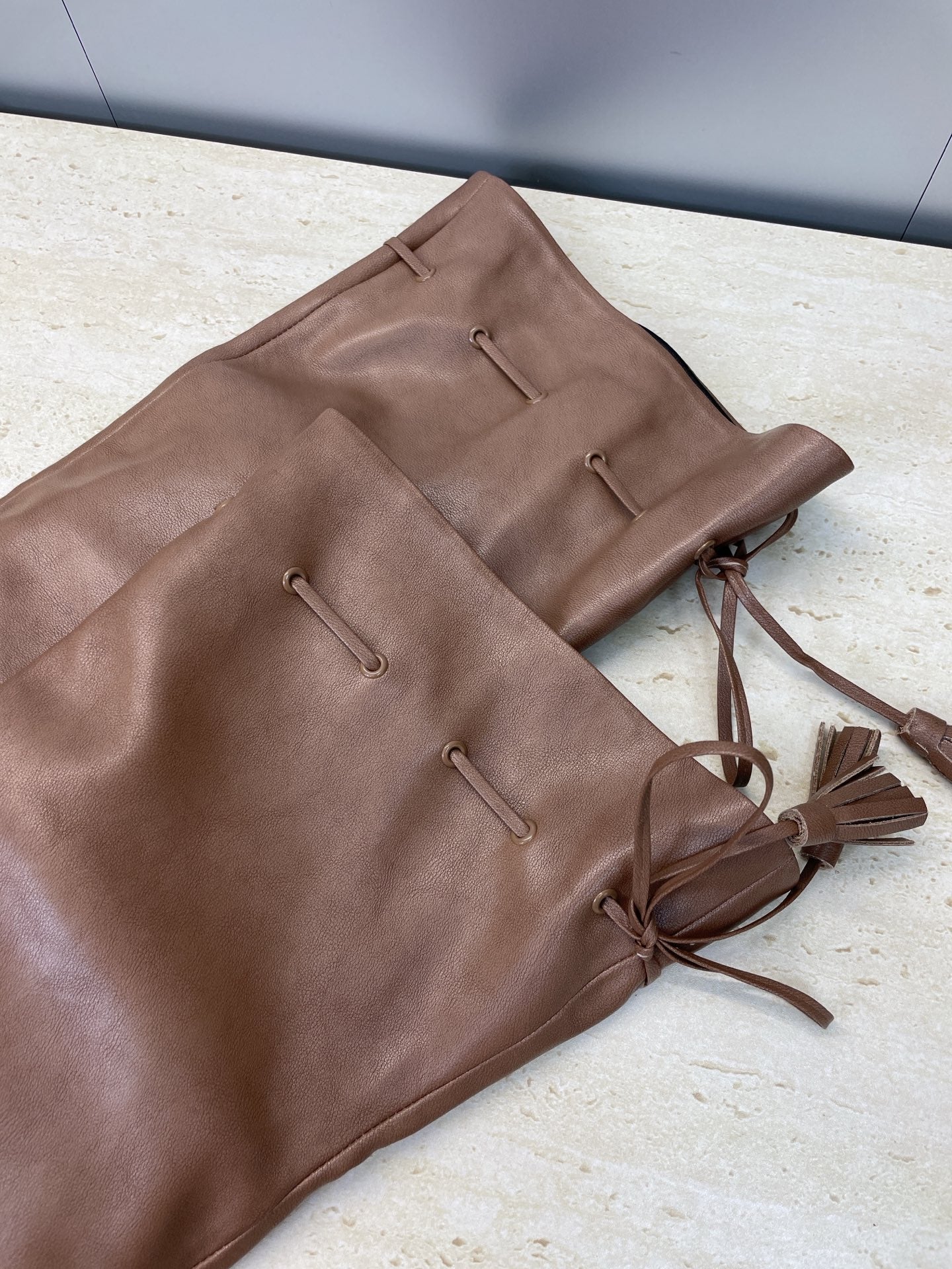 YSL 25S HIGH‑HEEL FRINGED MARTIN BOOTS 90 MM IN CHESTNUT BROWN LAMBSKIN