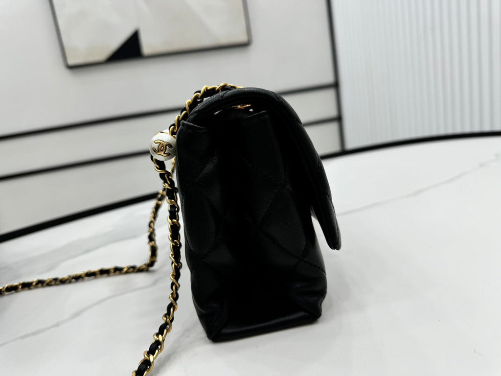 CHANEL 25S FLAP BAG 23 CM IN BLACK LAMBSKIN WITH PEARL TOP HANDLE