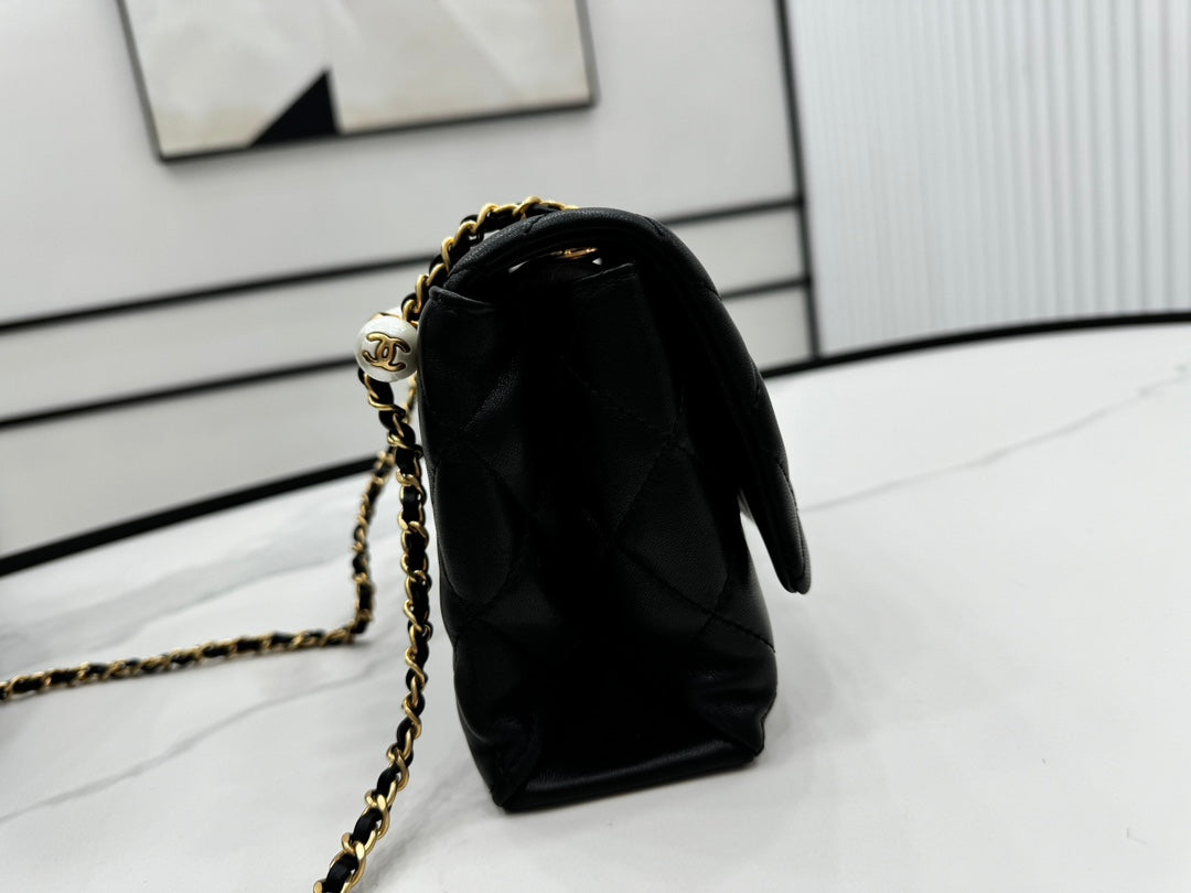 CHANEL 25S FLAP BAG 23 CM IN BLACK LAMBSKIN WITH PEARL TOP HANDLE
