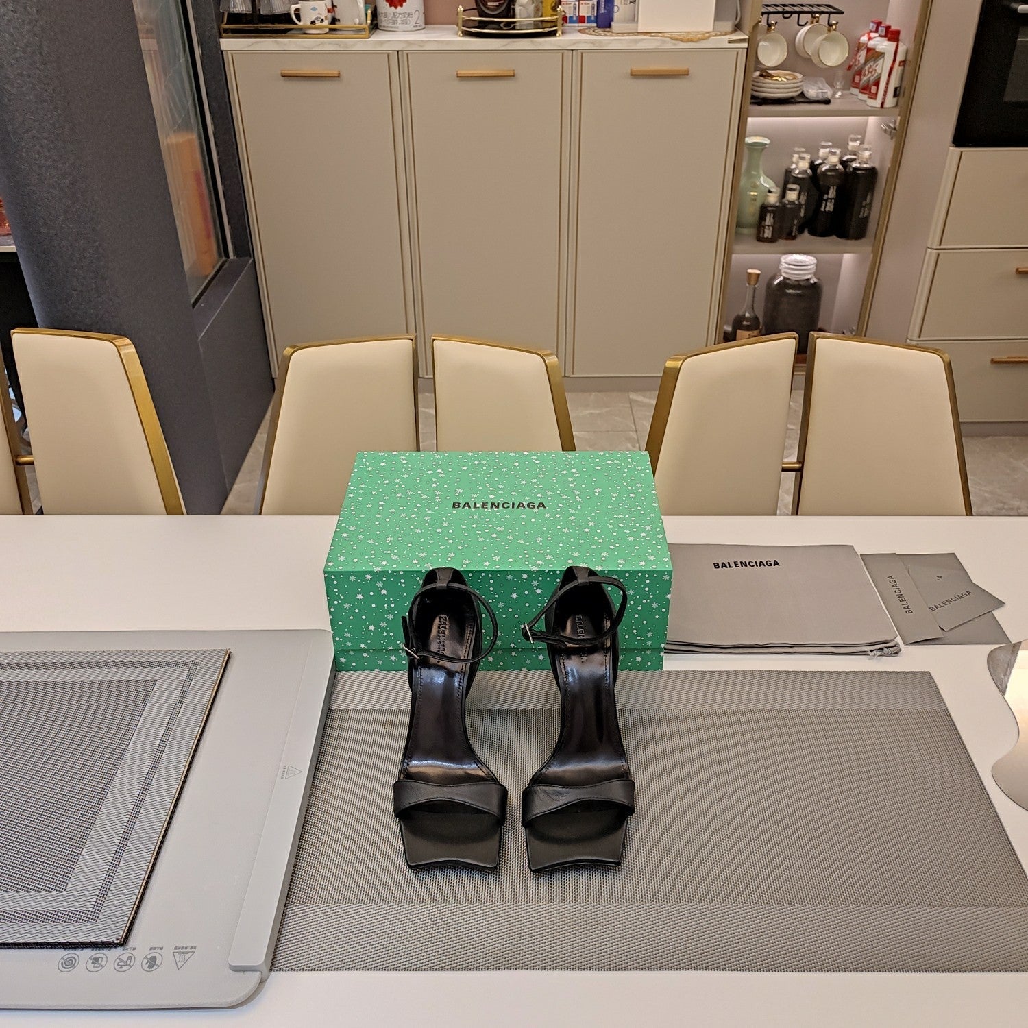 OPEN-TOE CURVED HIGH HEEL SANDALS IN BLACK SMOOTH CALFSKIN