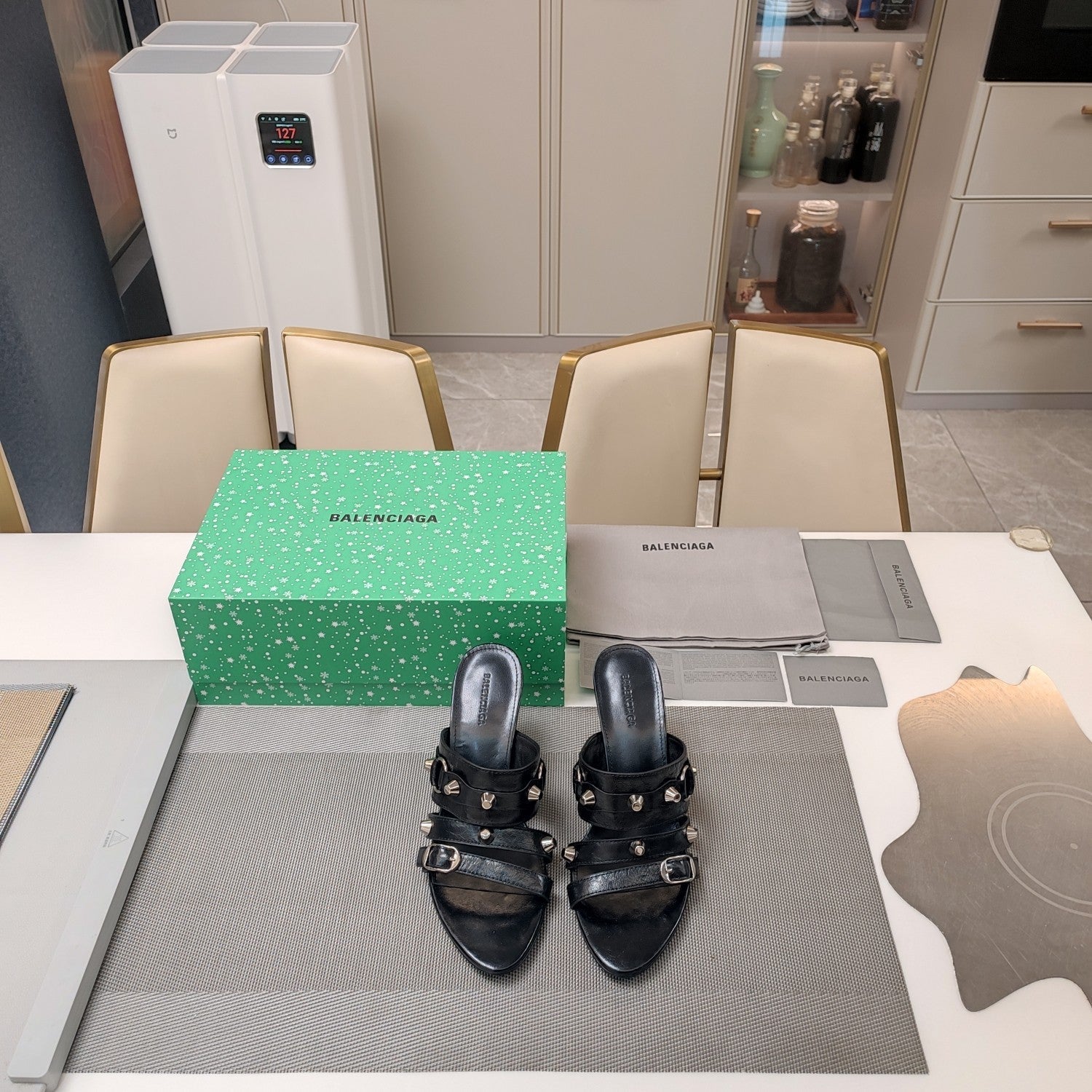 STRAPPY HIGH-HEELED SANDALS IN BLACK STUDDED WAX-OIL SHEEPSKIN