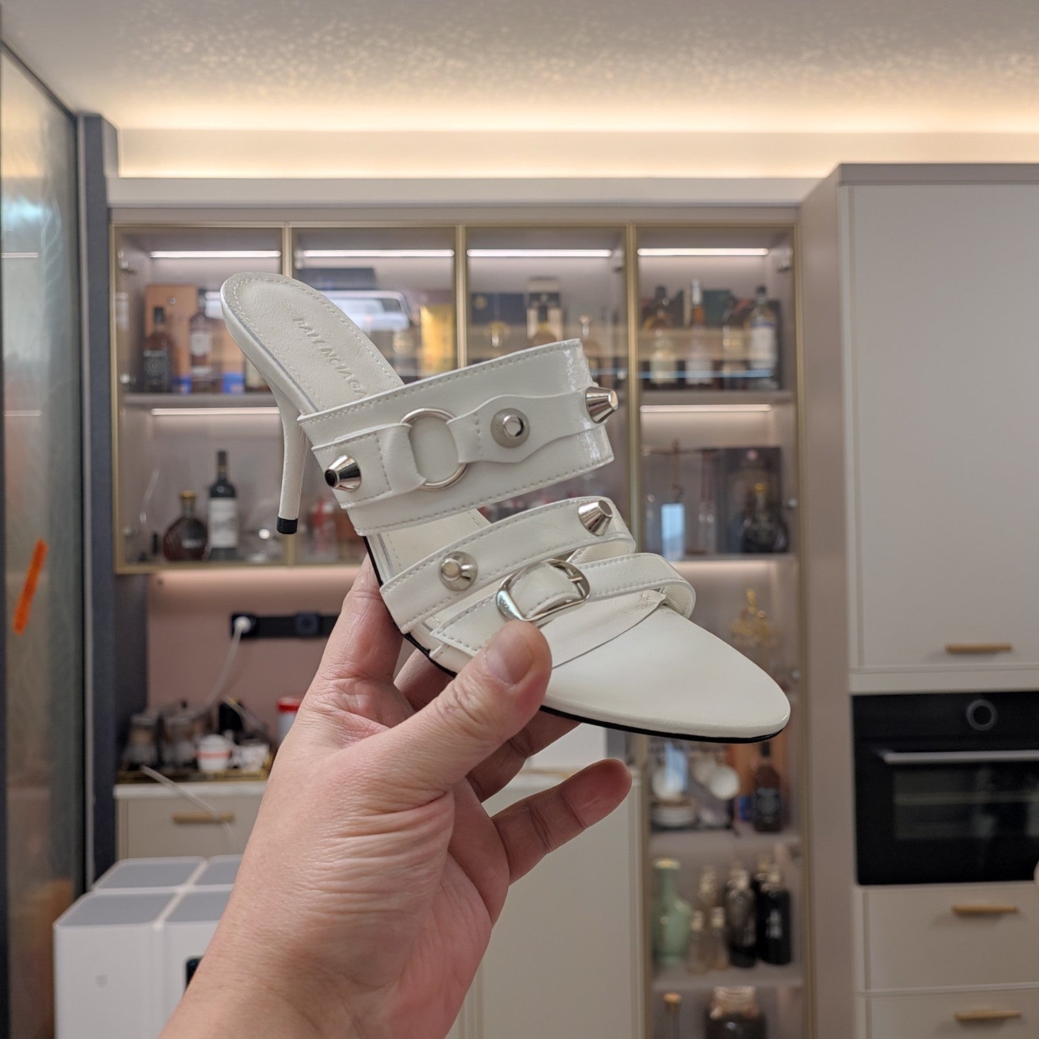 STRAPPY HIGH-HEELED SANDALS IN WHITE STUDDED WAX-OIL SHEEPSKIN