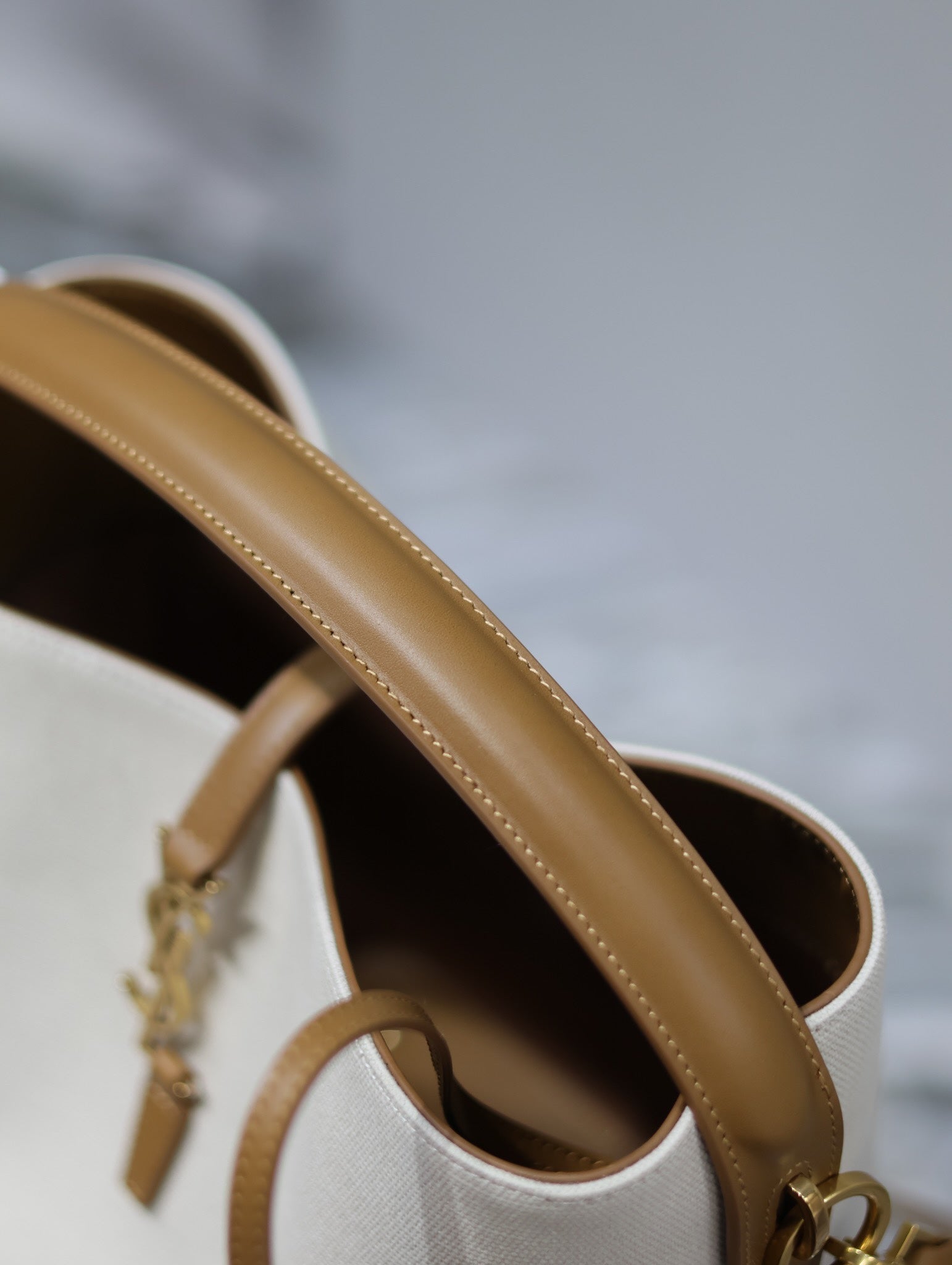 YSL 25S LE 5 À 7 BUCKET 26 IN CREAM BROWN CALFSKIN AND CANVAS GOLD HARDWARE