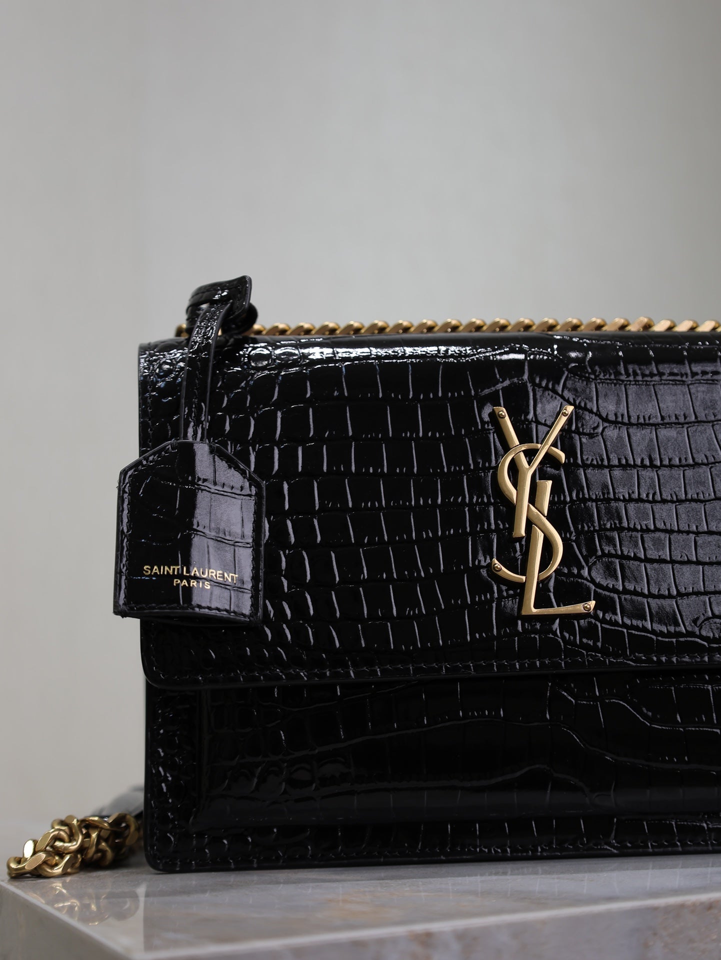 YSL 25S SUNSET MEDIUM 22 IN BLACK CROCODILE-EMBOSSED SHINY CALFSKIN GOLD HARDWRE