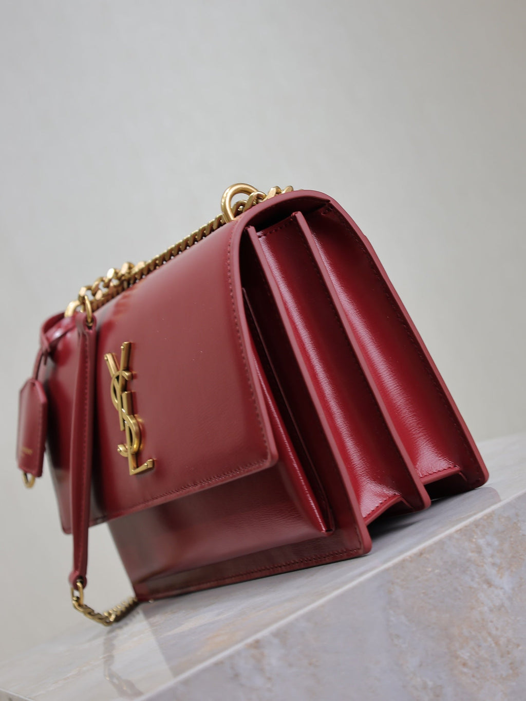 YSL 25S SUNSET BAG 22 IN CRIMSON RED CALFSKIN GOLD HARDWARE