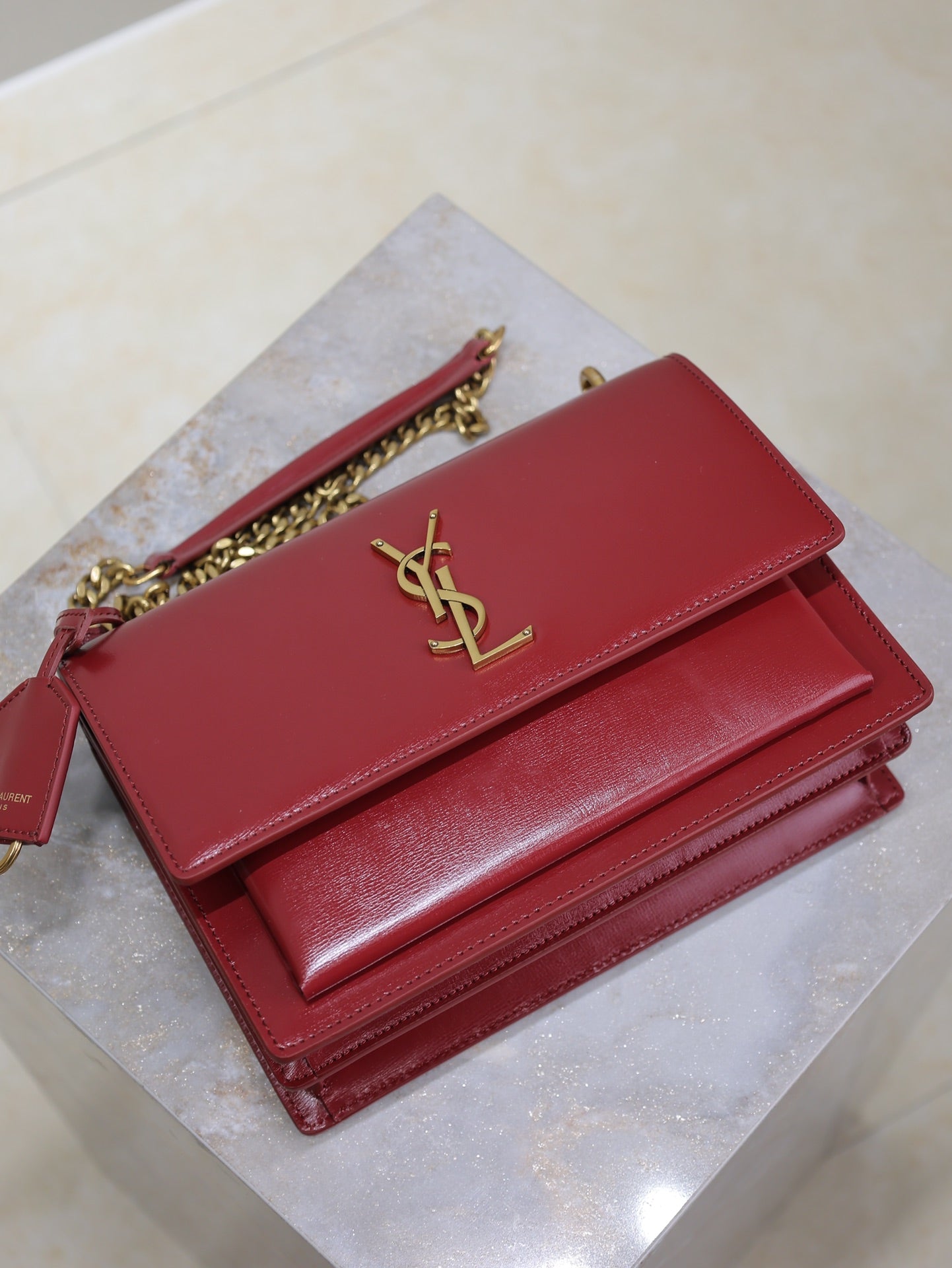 YSL 25S SUNSET BAG 22 IN CRIMSON RED CALFSKIN GOLD HARDWARE
