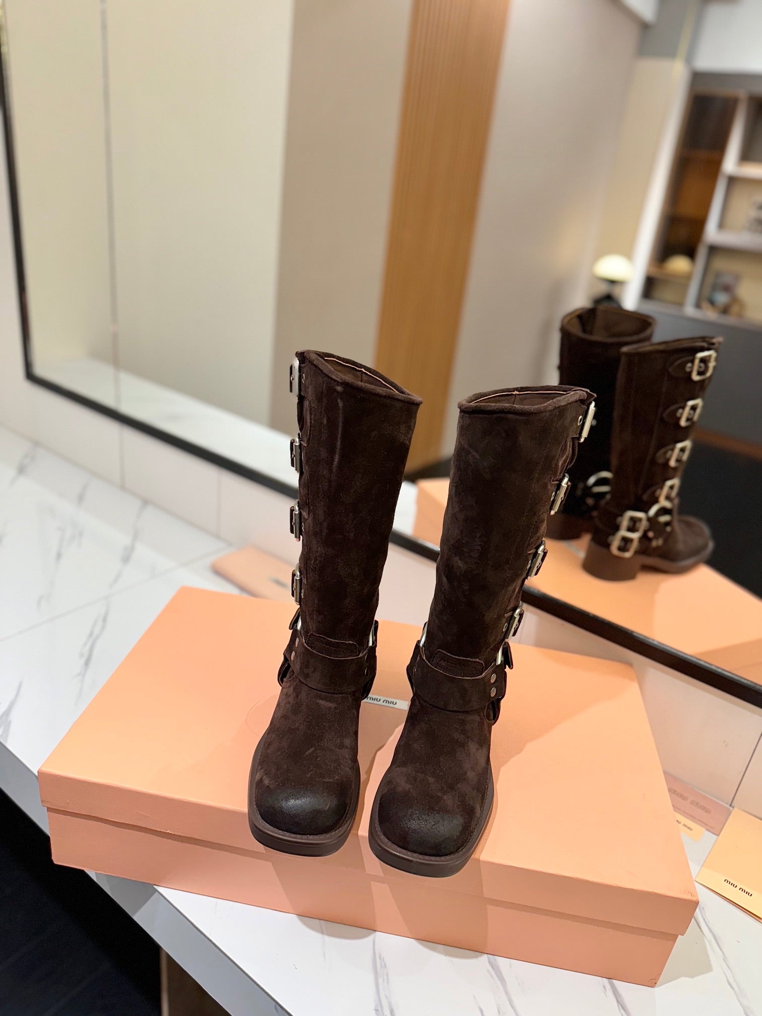 THICK-SOLED BUCKLE BOOTS IN BLACK SUEDE