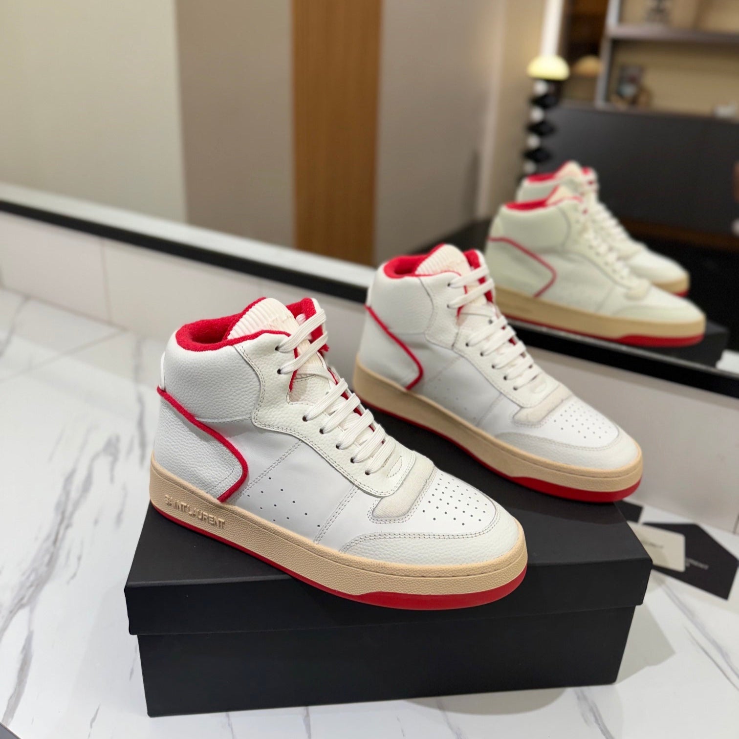 MID-TOP SNEAKERS IN WHITE AND RED TRIM PERFORATED LAMBSKIN