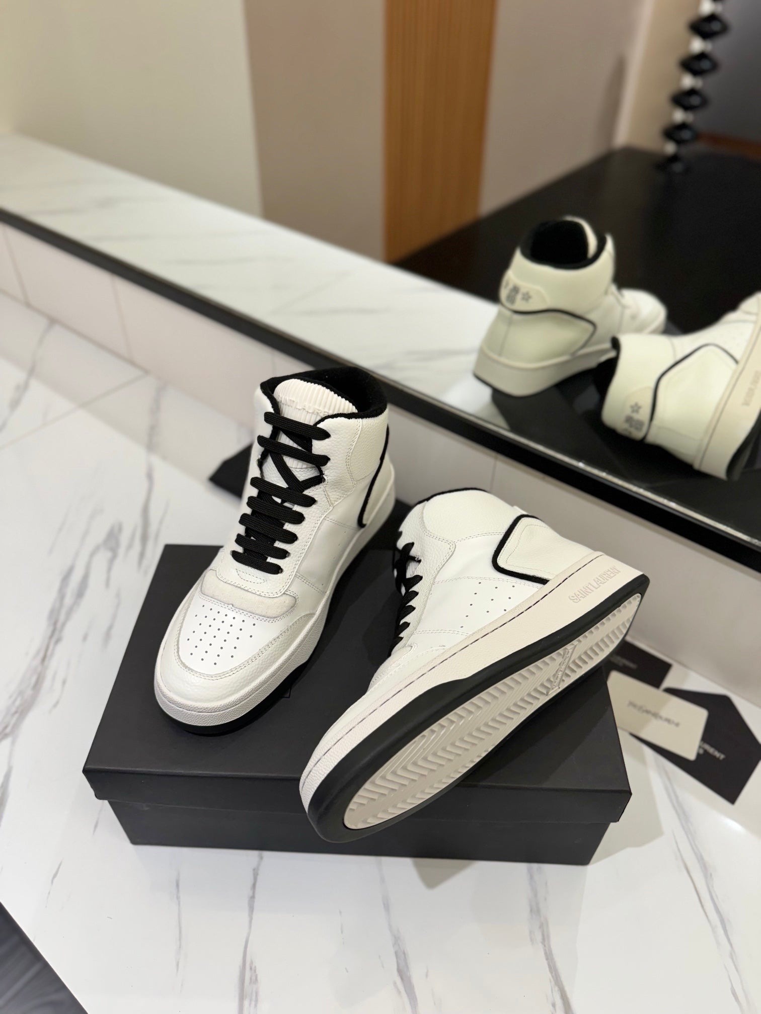 MID-TOP SNEAKERS IN WHITE AND BLACK TRIM PERFORATED LAMBSKIN