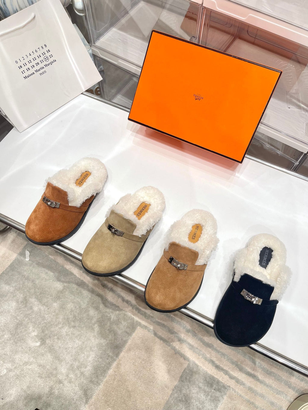 SLIP-ON MULE IN UMBER BROWN SUEDE AND SHEARLING LINING