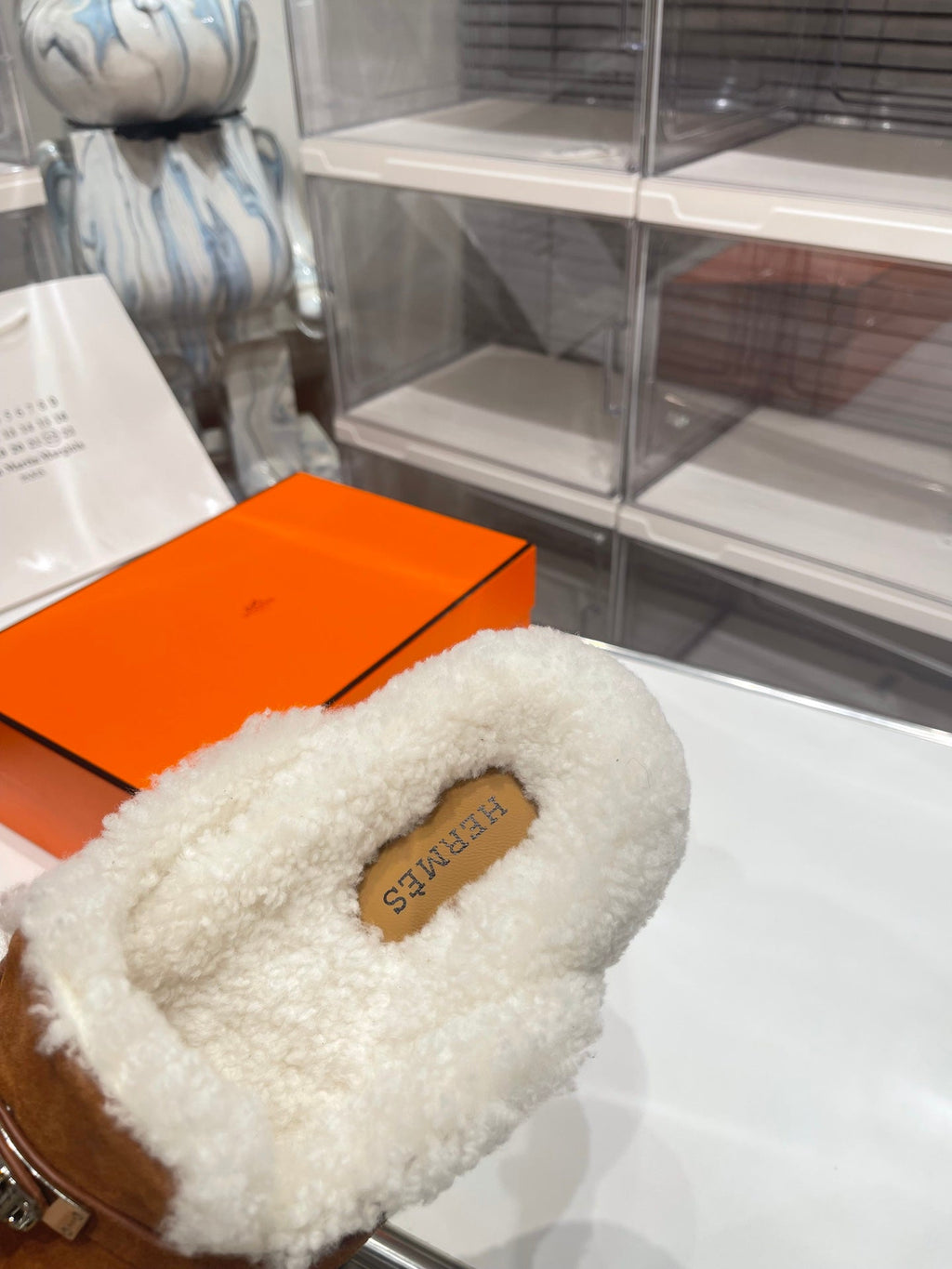 SLIP-ON MULE IN UMBER BROWN SUEDE AND SHEARLING LINING