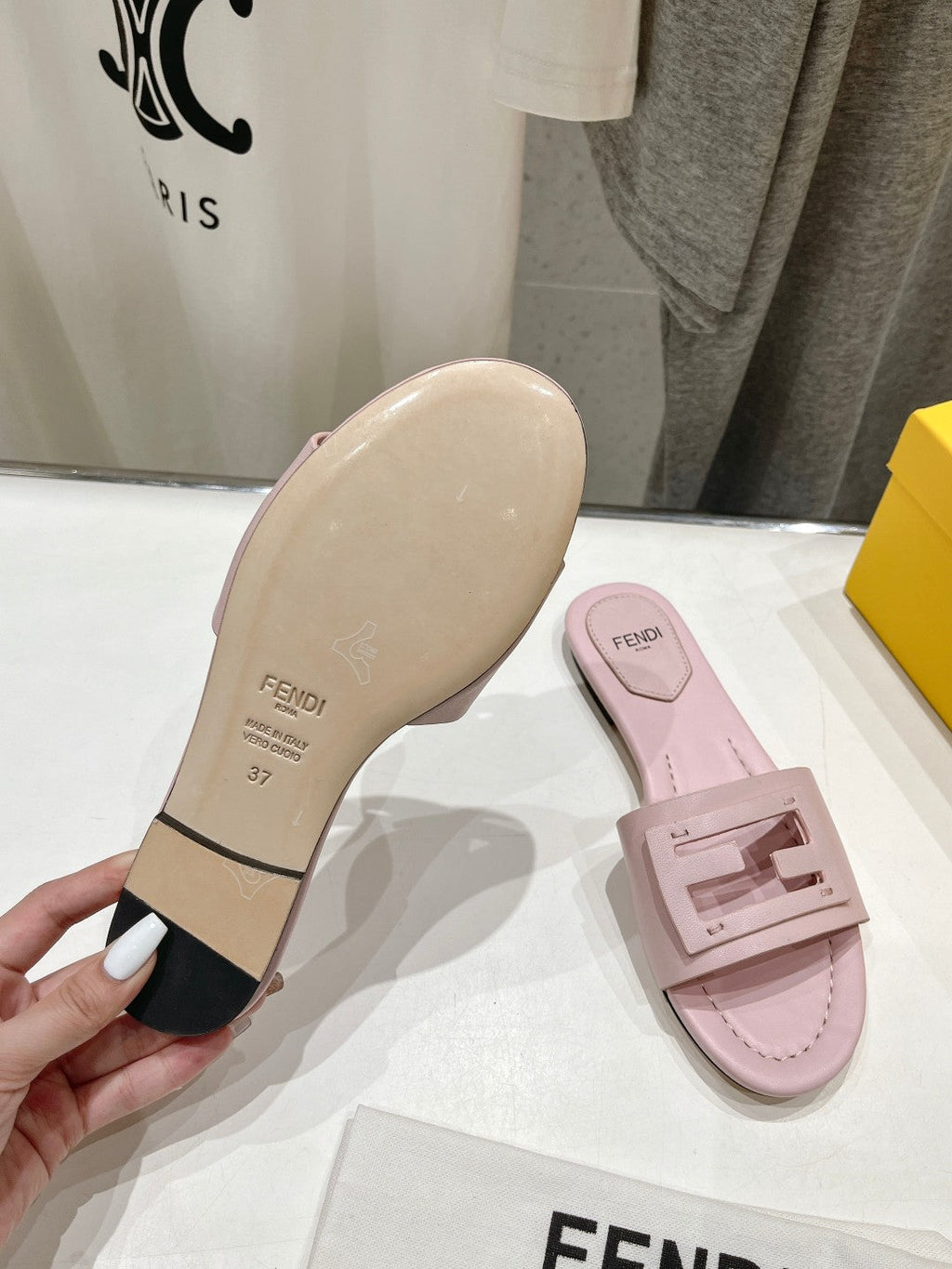 FENDI BAGUETTE SLIDES IN LIGHT PINK LAMBSKIN