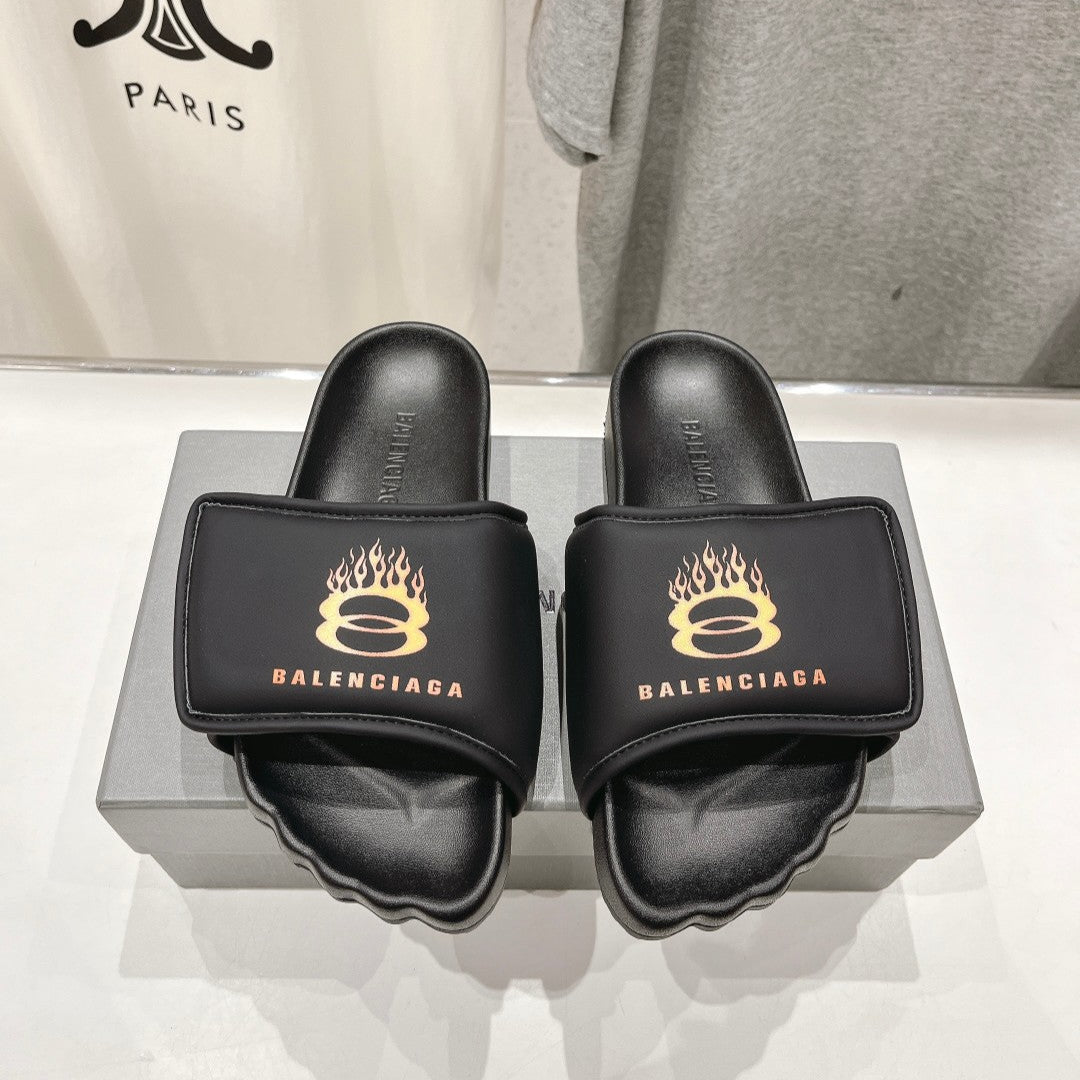 SLIDE SANDALS IN BLACK NYLON AND RUBBER YELLOW PRINT