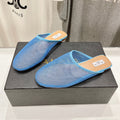 ALAIA FLAT MULES IN CERULEAN BLUE MESH FISHNET