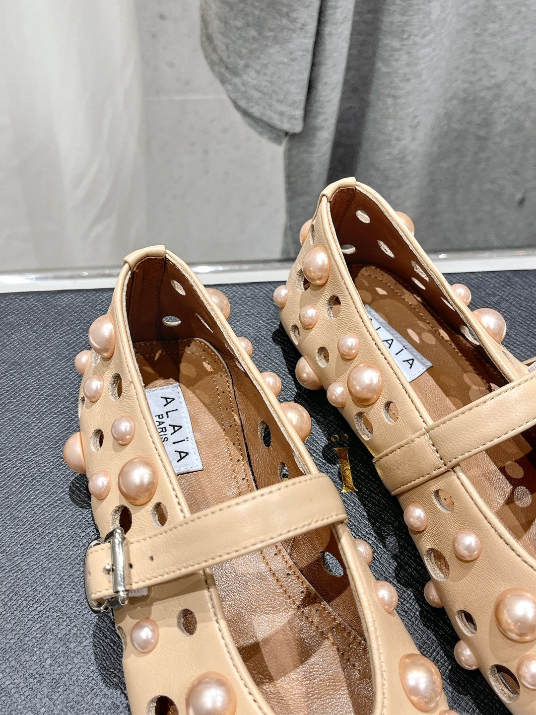 ALAIA PEARL MARY JANE SHOES IN BISQUE BEIGE LAMBSKIN