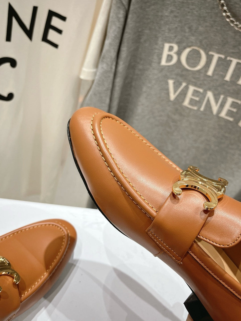 TRIOMPHE LOAFER IN BRONZE BROWN SMOOTH CALFSKIN GOLD HARDWARE