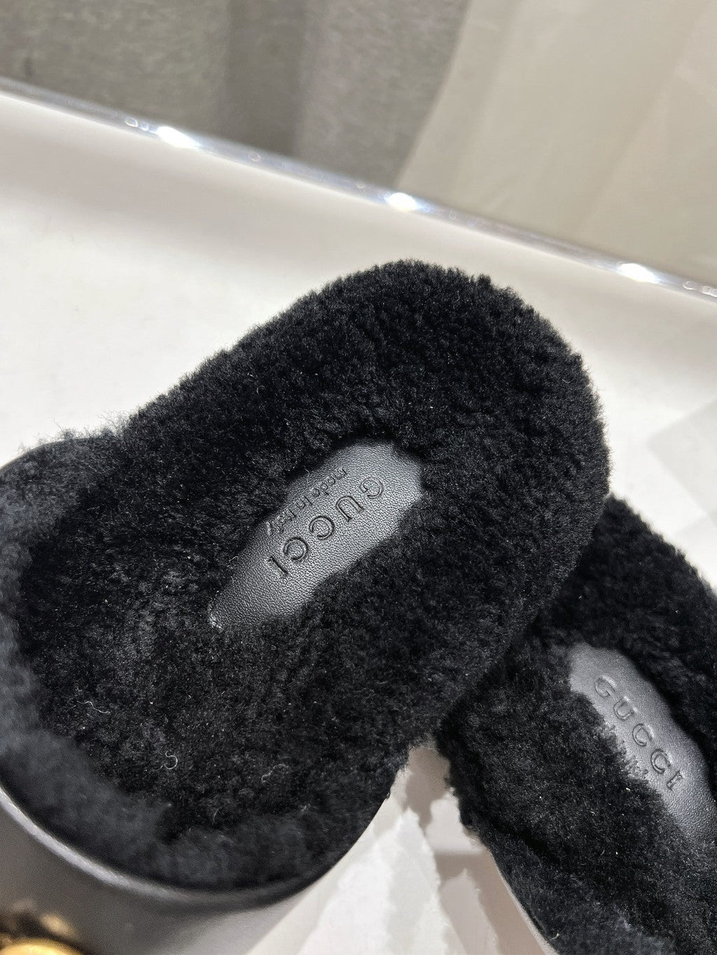 HORSEBIT MULE IN BLACK CALFSKIN AND FLEECE LINING