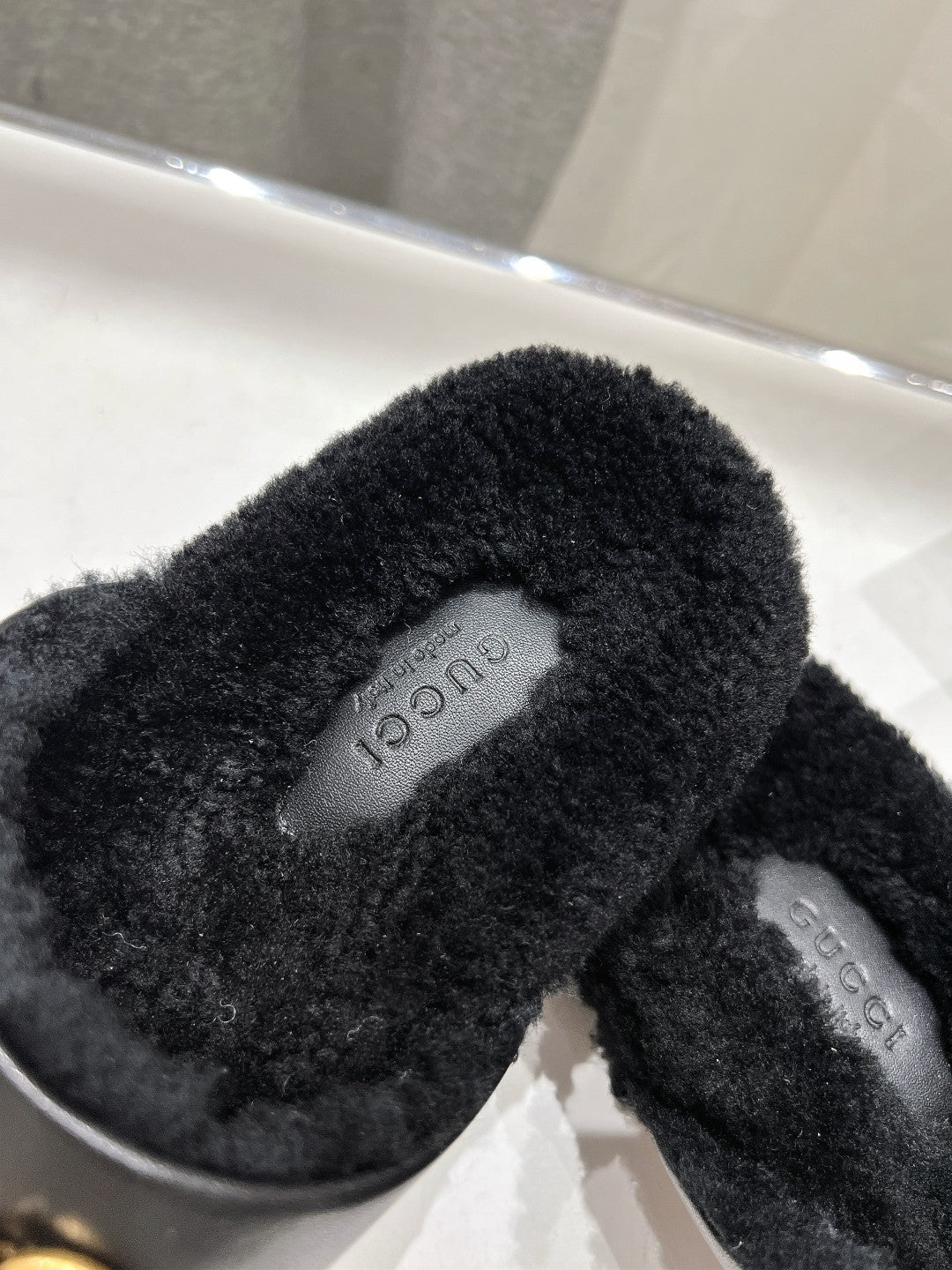 HORSEBIT MULE IN BLACK CALFSKIN AND FLEECE LINING