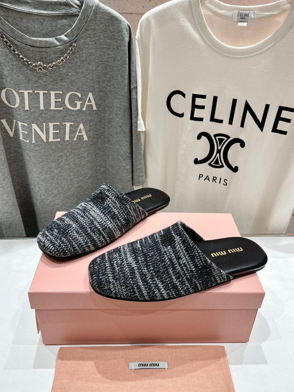 KNITTED MULES IN BLACK MIX WHITE WOOL