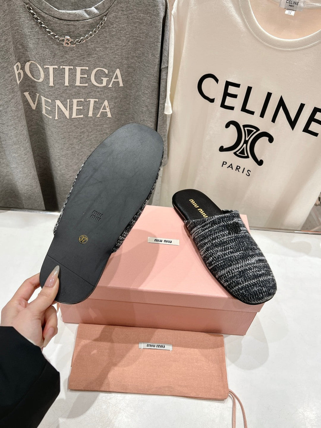 KNITTED MULES IN BLACK MIX WHITE WOOL