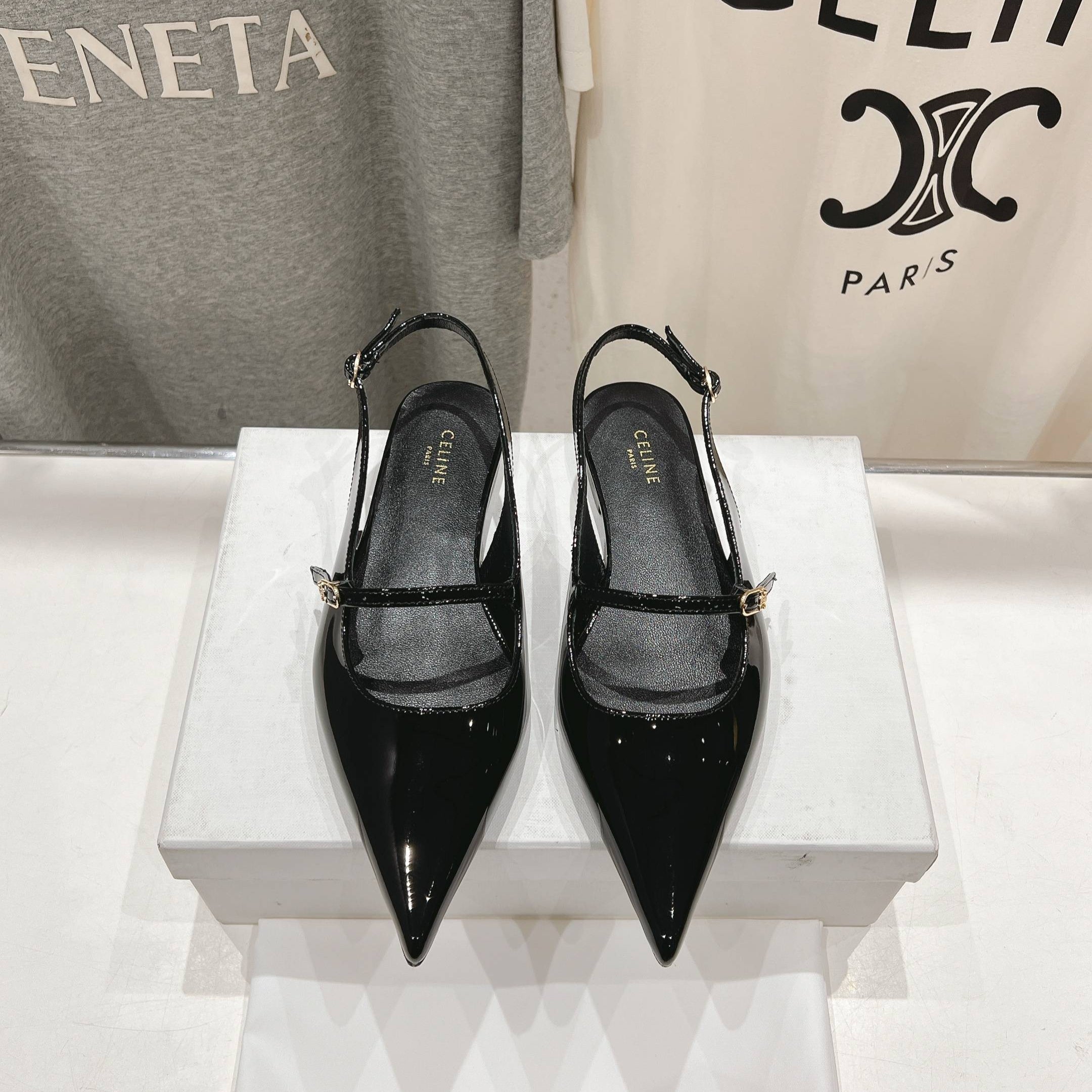 JUDY FLAT SLINGBACK IN BLACK PATENT CALFSKIN