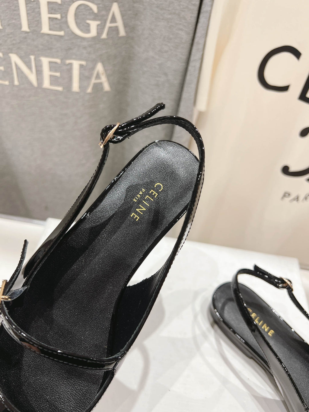 JUDY FLAT SLINGBACK IN BLACK PATENT CALFSKIN