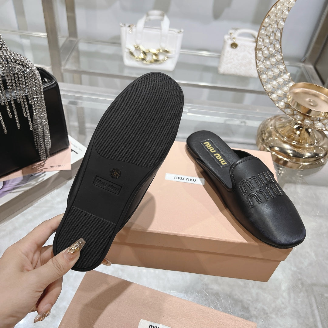 MULES SLIPPERS BLACK COWHIDE