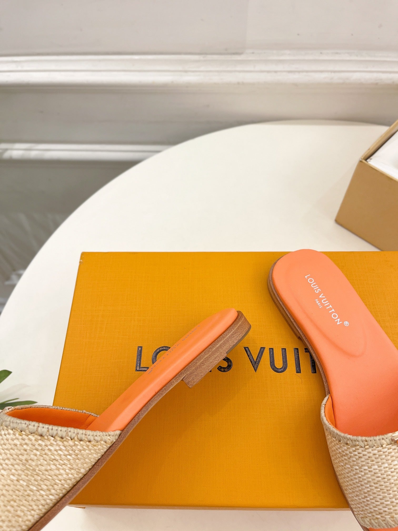 LV WOMEN CAPRI FLAT MULES IN TIGER ORANGE LEATHER AND RAFFIA