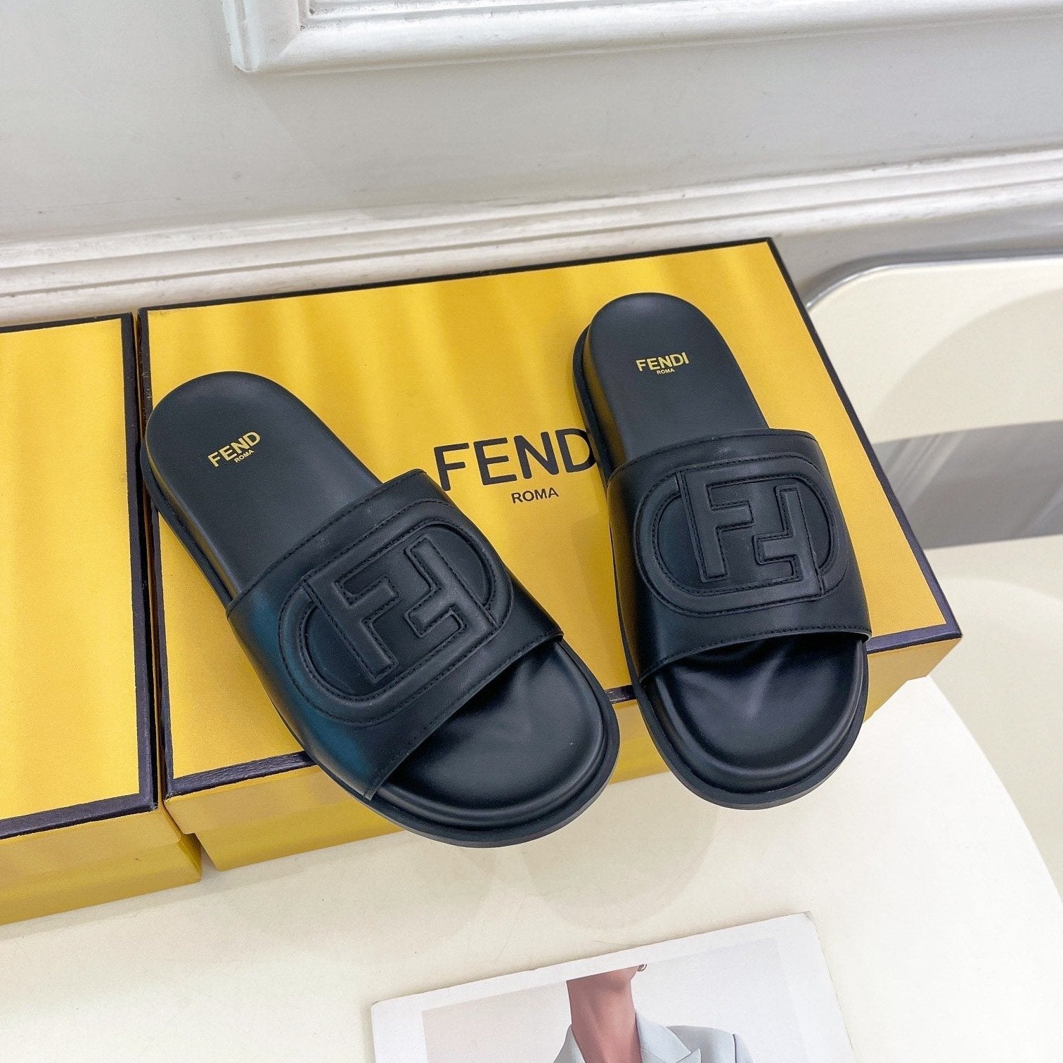 FENDI LOGO SLIDES IN BLACK CALFSKIN