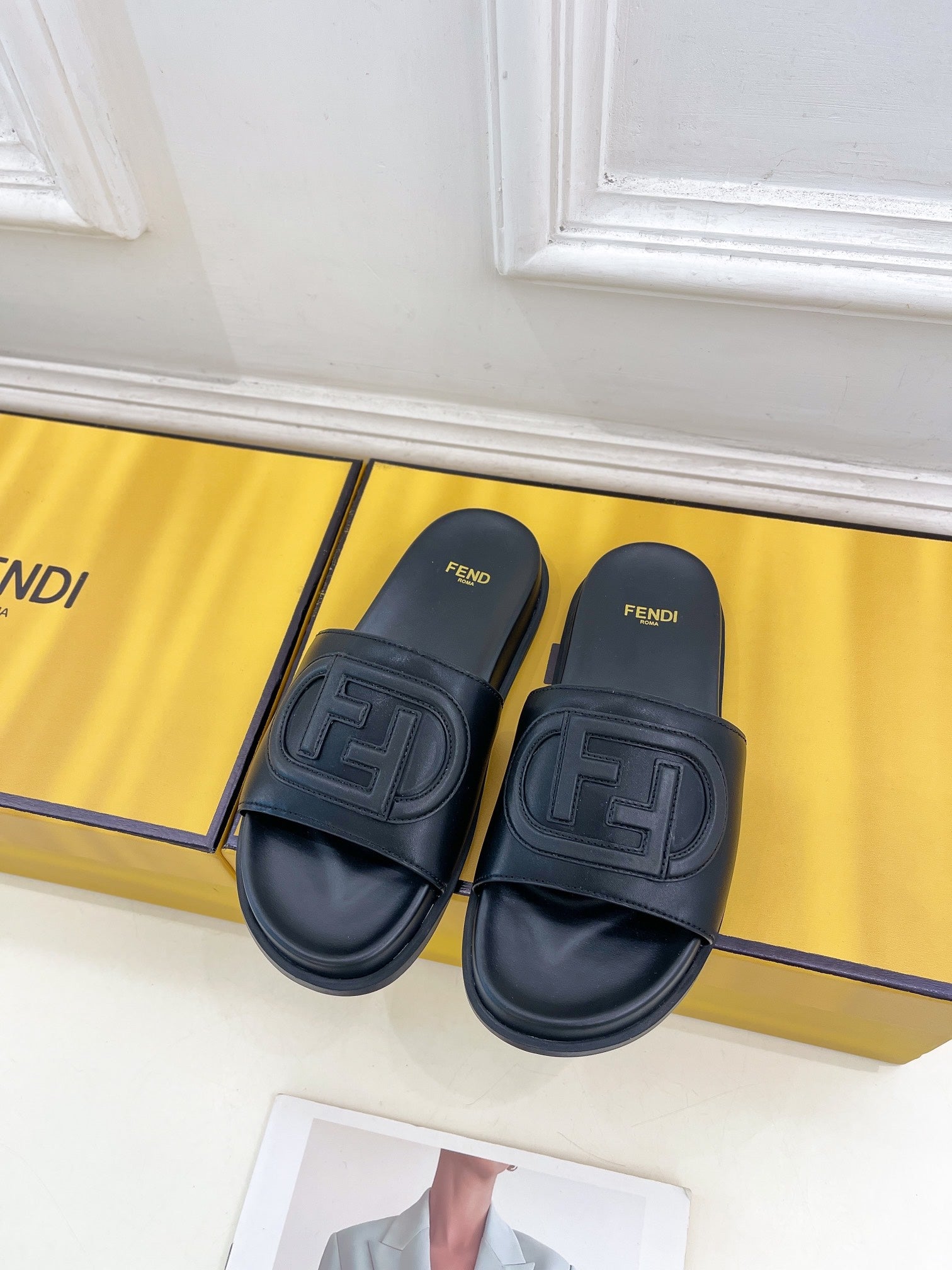 FENDI LOGO SLIDES IN BLACK CALFSKIN