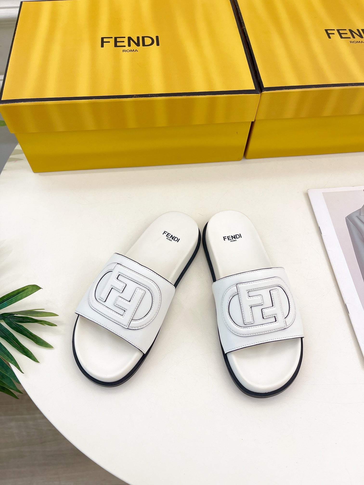 FENDI LOGO SLIDES IN WHITE CALFSKIN