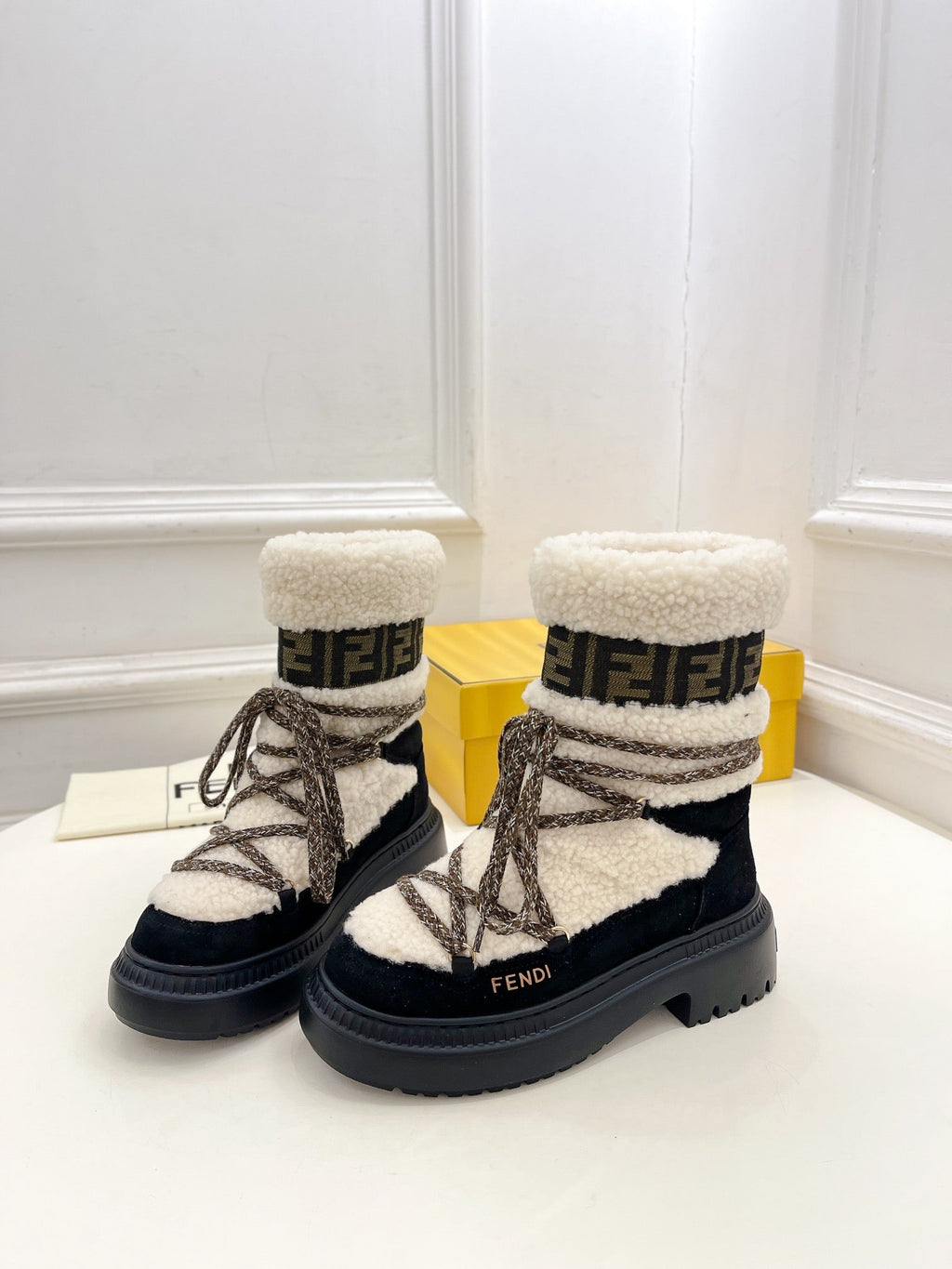 FENDI BOOTS 50MM IN BLACK AND BEIGE SHEARLING AND SUEDE