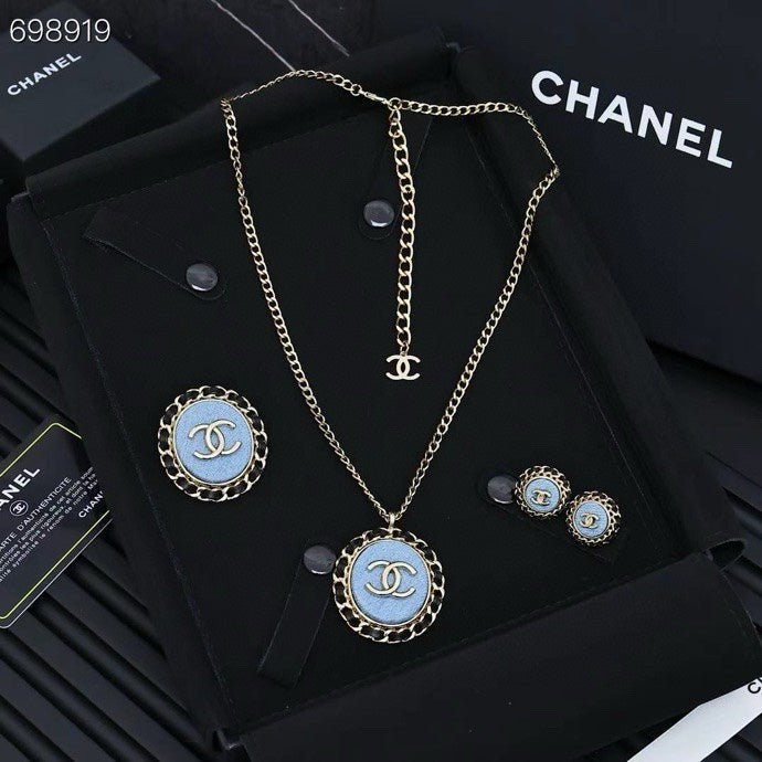 25P BROOCH IN BLUE DENIM BLACK LEATHER-THREADED OVAL