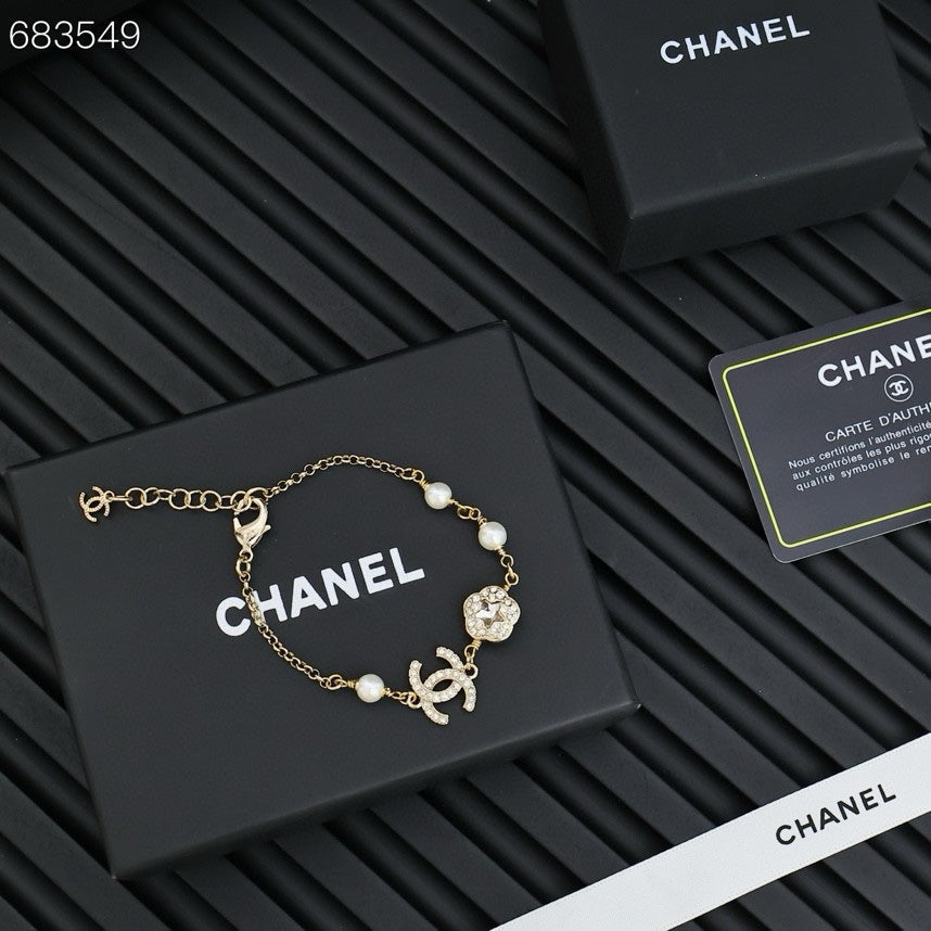 CC BRACELET 25P IN GOLD METAL PEARLY WHITE AND CRYSTAL