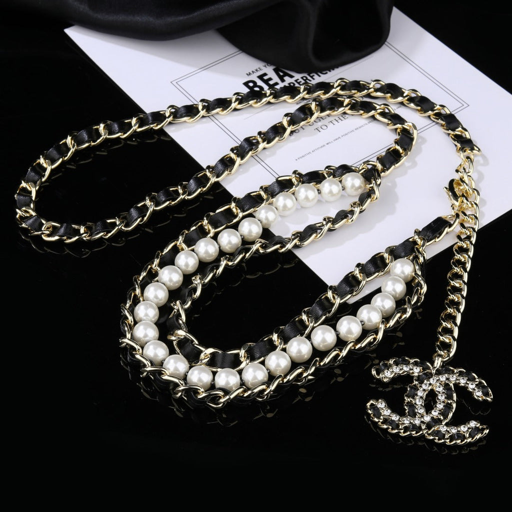 CHANEL 25S CHAIN BELT IN WHITE PEARL AND BLACK CALFSKIN 612711