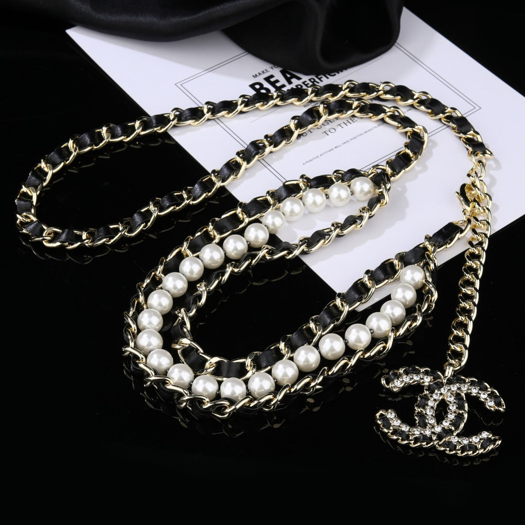CHANEL 25S CHAIN BELT IN WHITE PEARL AND BLACK CALFSKIN 612711